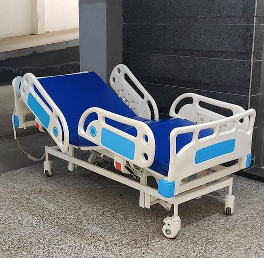 Motorised ICU hospital bed on rent in Delhi with side rails